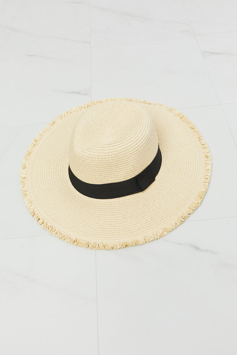 Fame Time For The Sun Straw Hat with fringe rim and black ribbon detail, perfect for sun protection and stylish summer outings.