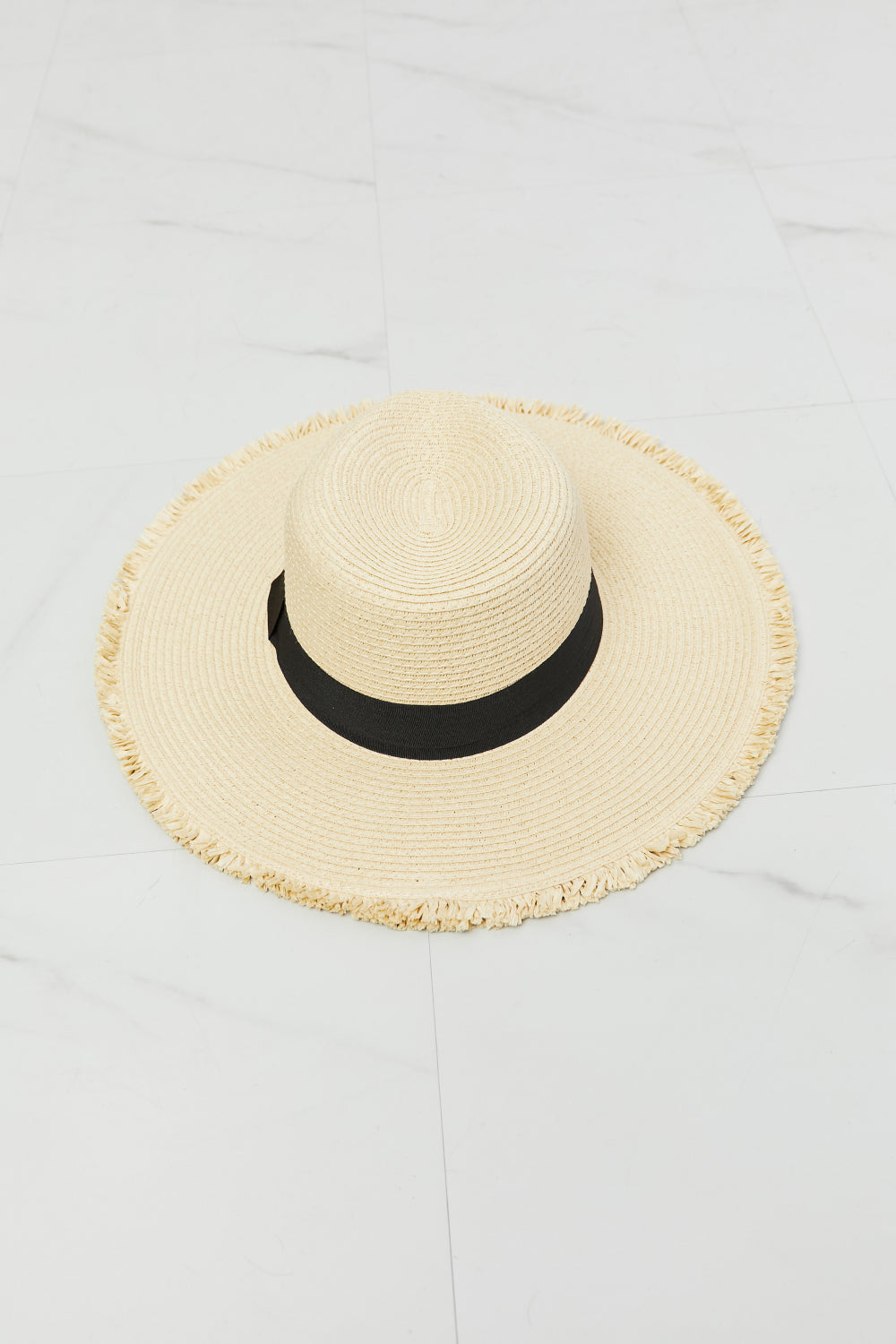 Fame Time For The Sun Straw Hat with fringe rim and black ribbon detail, perfect for sun protection and stylish summer outings.