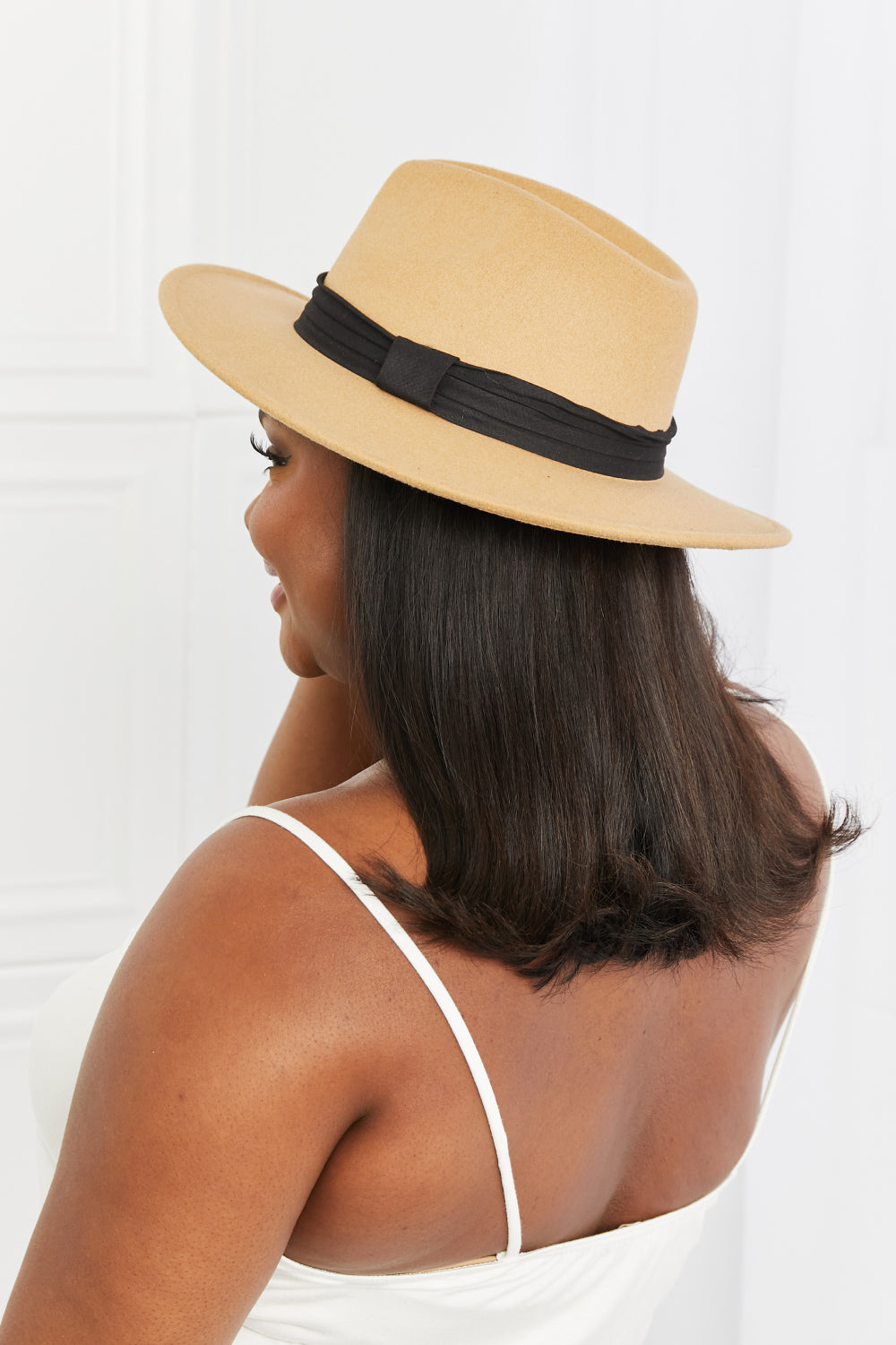 Fame You Got It Fedora Hat in dark tan with black ribbon detail, showcasing its stylish design and adjustable straps.