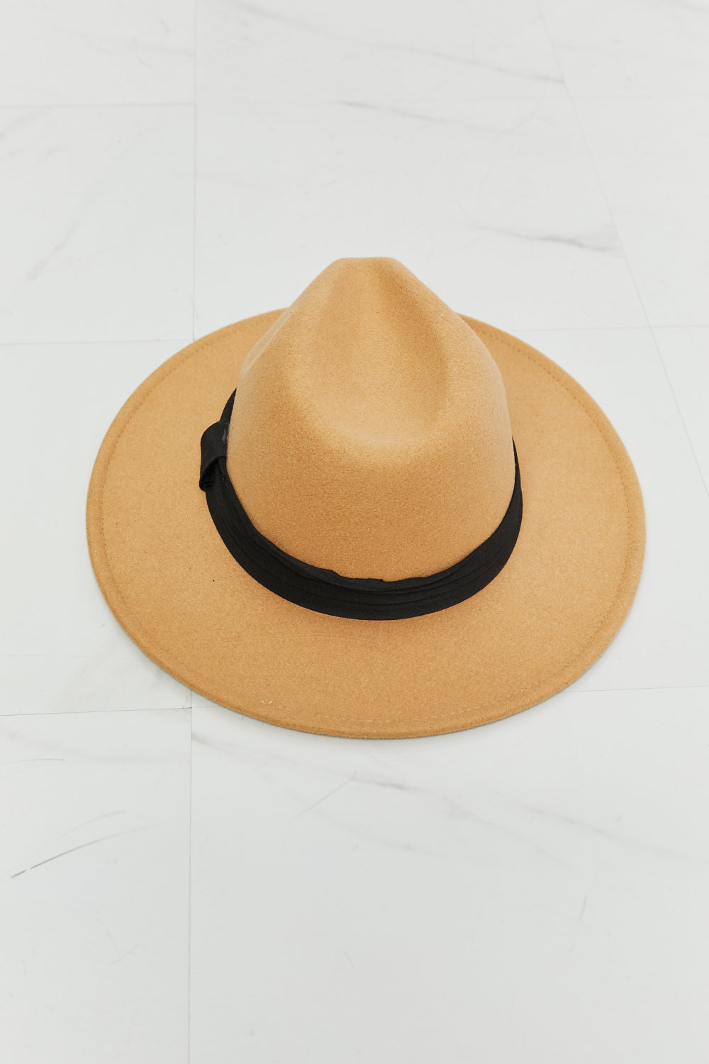 Fame You Got It Fedora Hat in dark tan with black ribbon detail, showcasing its stylish design and adjustable straps.