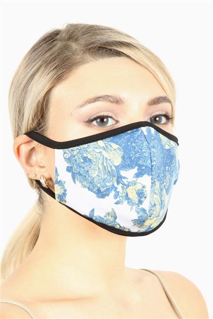 Floral double layer contoured face mask with clean folded edging, made in the USA, packaged in zip lock bags.