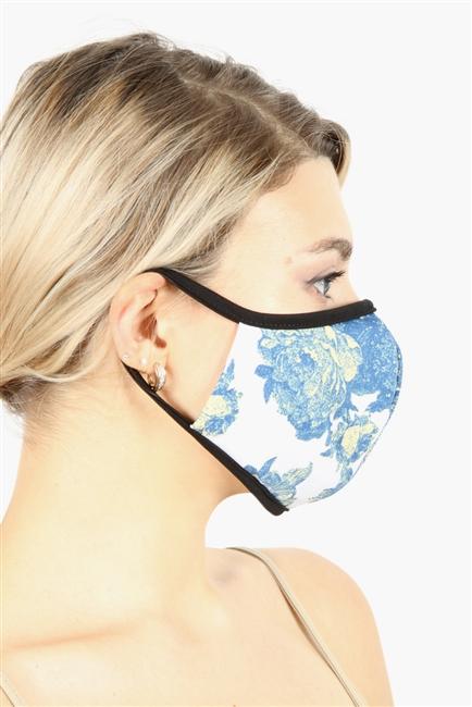 Floral double layer contoured face mask with clean folded edging, made in the USA, packaged in zip lock bags.