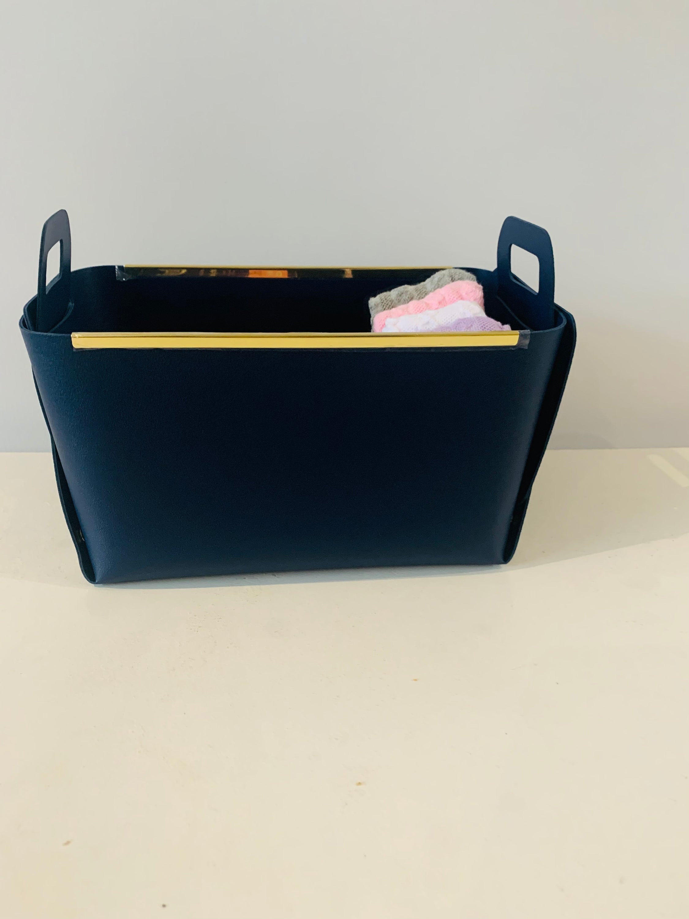 Faux Leather Portable Storage Box in a stylish design, perfect for organizing items while traveling.