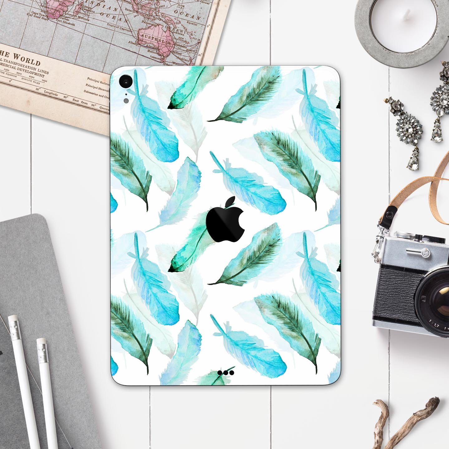 Feathery Watercolor skin decal for Apple iPad Pro, showcasing vibrant colors and a sleek design, providing full-body protection.