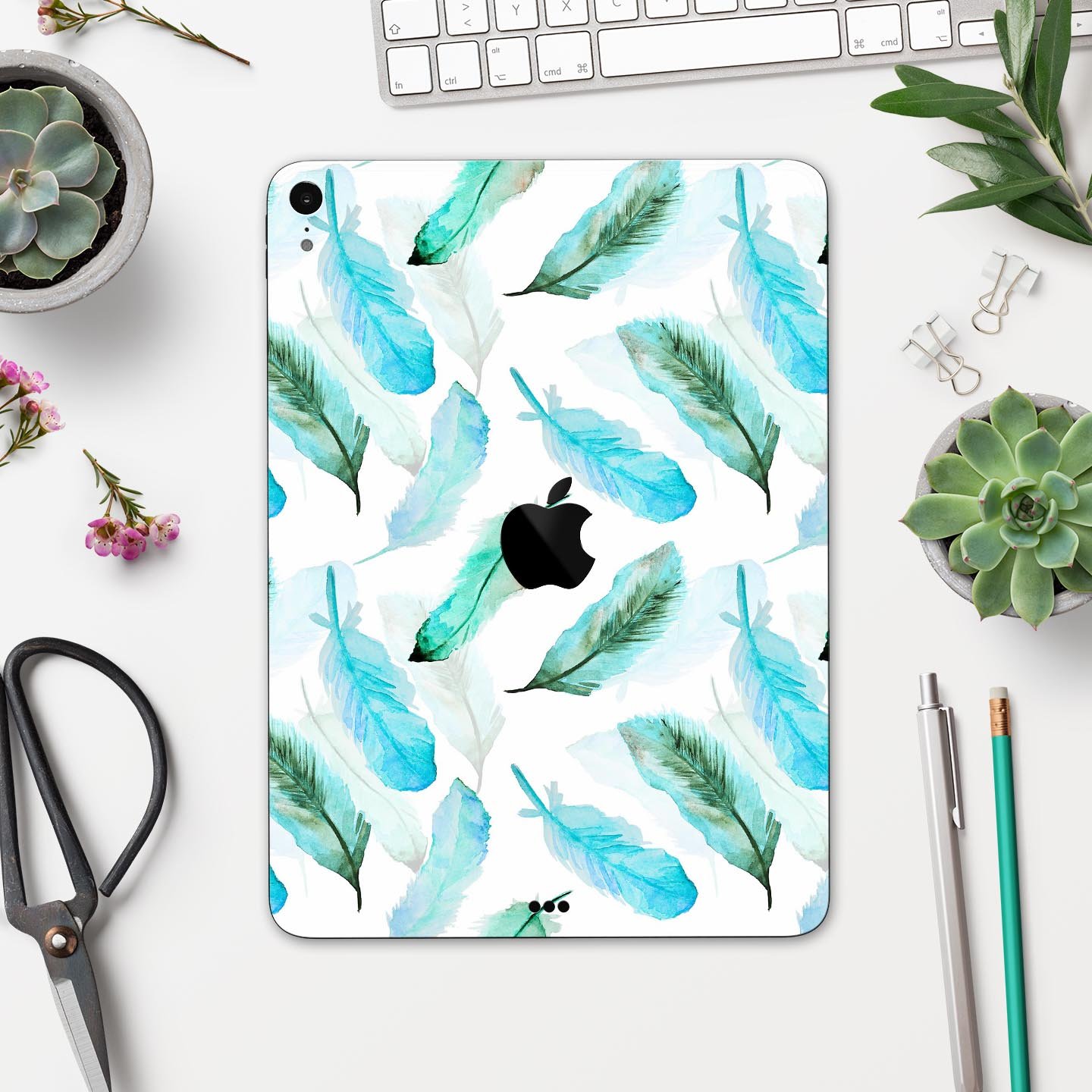 Feathery Watercolor skin decal for Apple iPad Pro, showcasing vibrant colors and a sleek design, providing full-body protection.