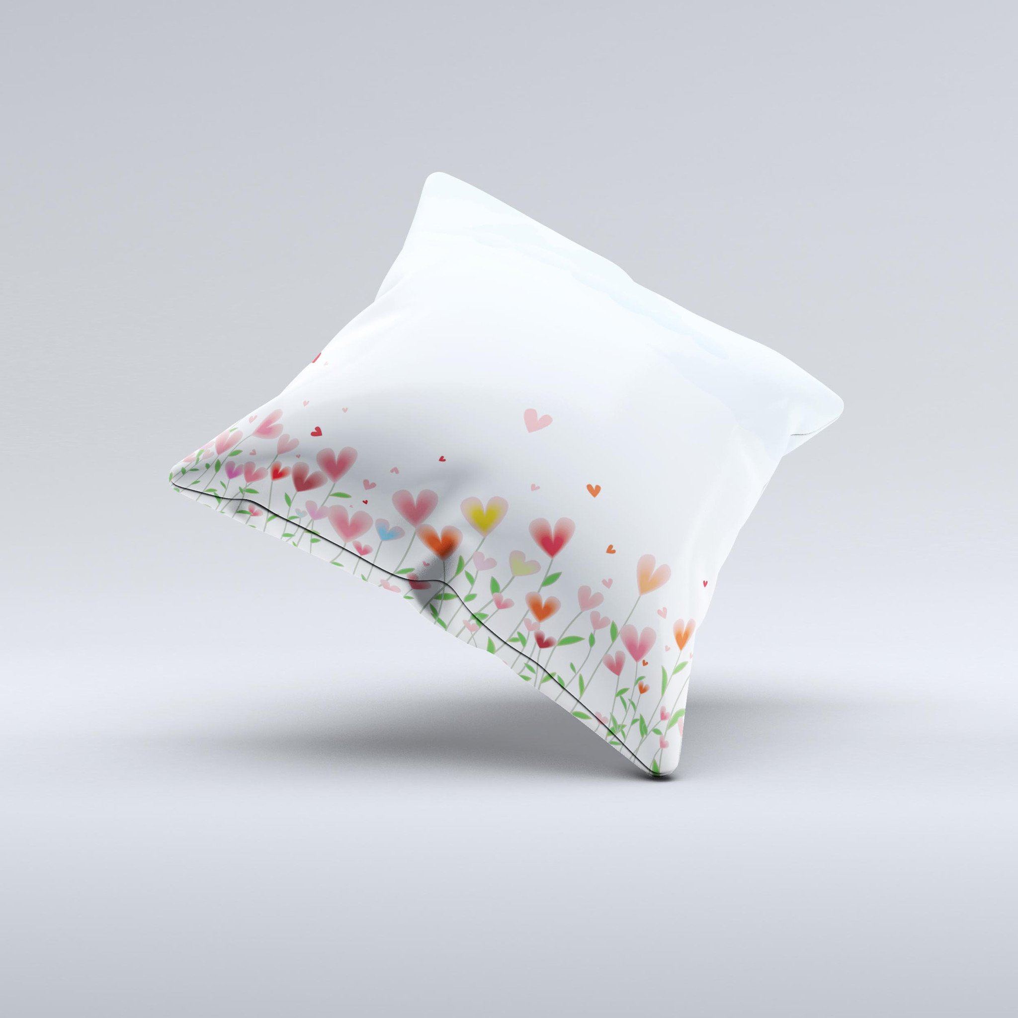 Field of Blooming Hearts decorative throw pillow featuring vibrant heart designs on a soft fabric, handcrafted in Virginia.