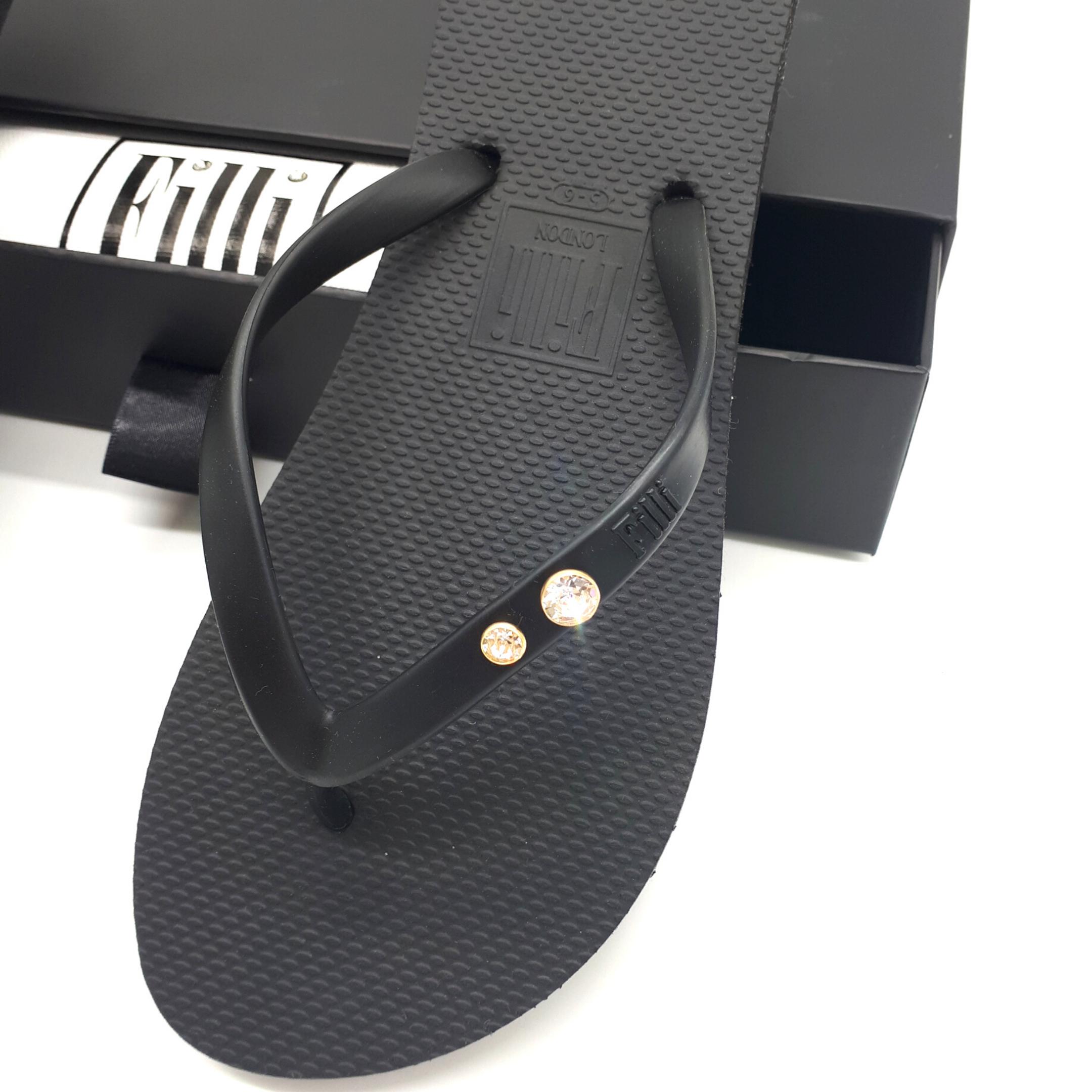 Filli London Crystal Diamond black luxury flip flops featuring Swarovski® crystals in gold and silver settings.