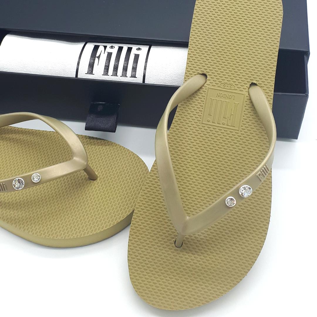 Filli London Crystal Diamond flip flops featuring Swarovski® crystals in gold setting, elegantly designed for comfort and style.