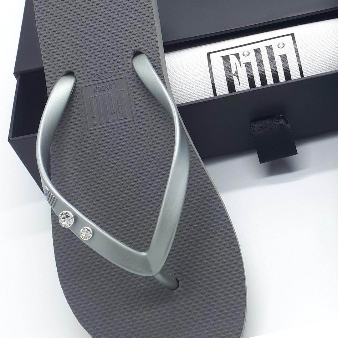 Filli London Crystal Diamond flip flops featuring Swarovski® crystals in a silver setting, elegantly designed for comfort and style.