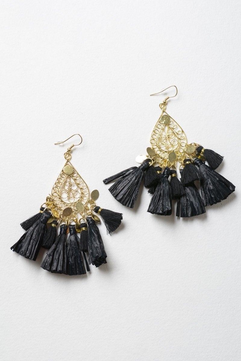 Elegant Filigree Raffia Tassel Earrings featuring intricate brass design and soft tassels, perfect for stylish accessorizing.