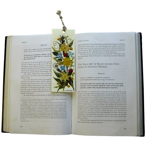 A beautifully handcrafted Floral Book Mark featuring dried flowers and plants, showcasing vibrant colors and intricate designs on both sides.