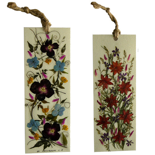 A beautifully handcrafted Floral Book Mark featuring dried flowers and plants, showcasing vibrant colors and intricate designs on both sides.