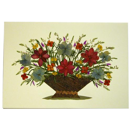 A beautifully handcrafted Floral Gift Card featuring dried flowers and plants, showcasing unique artistry from El Salvador.