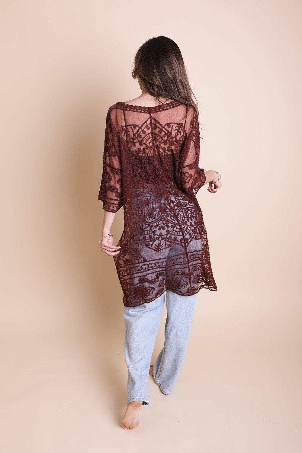 A lightweight floral mandala mesh kimono featuring intricate embroidery, perfect for casual wear.