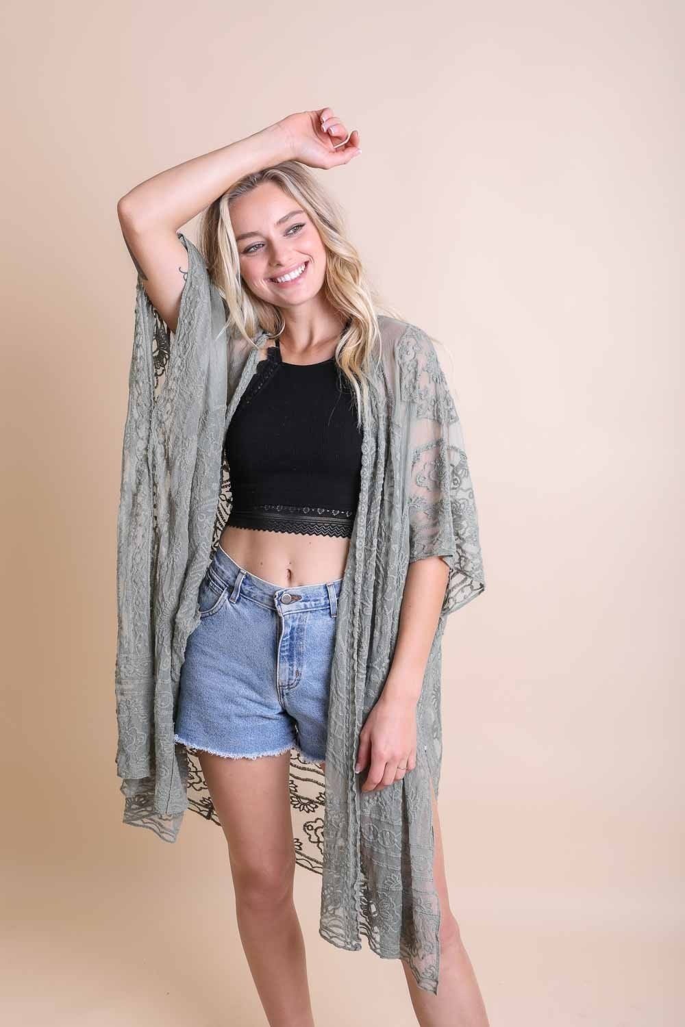 A lightweight floral mandala mesh kimono featuring intricate embroidery, perfect for casual wear.