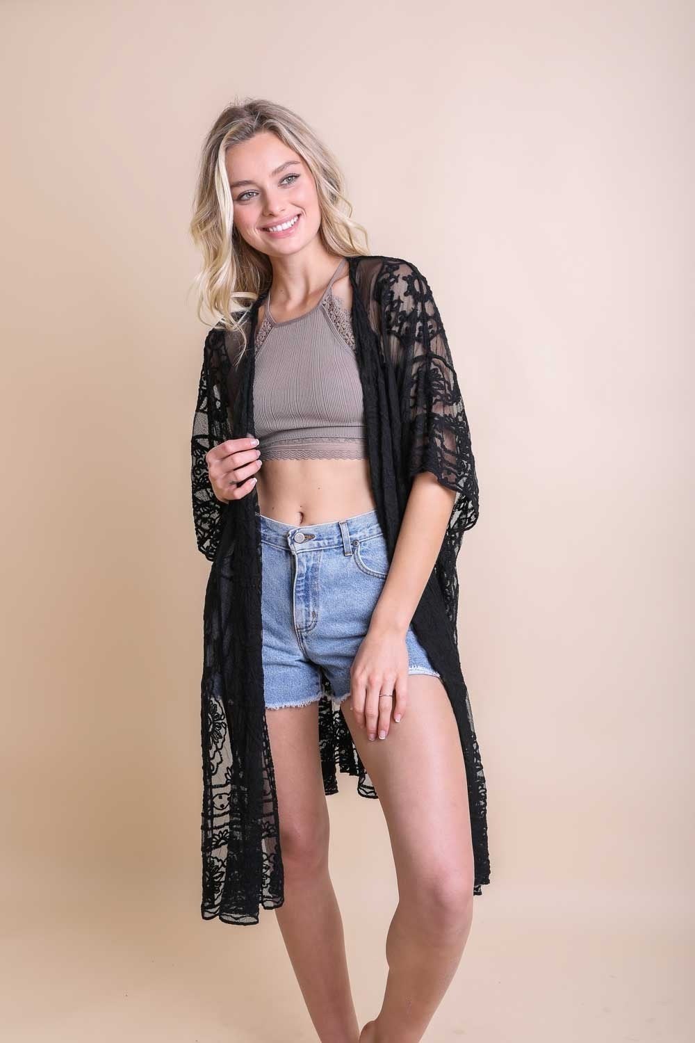 A lightweight floral mandala mesh kimono featuring intricate embroidery, perfect for casual wear.