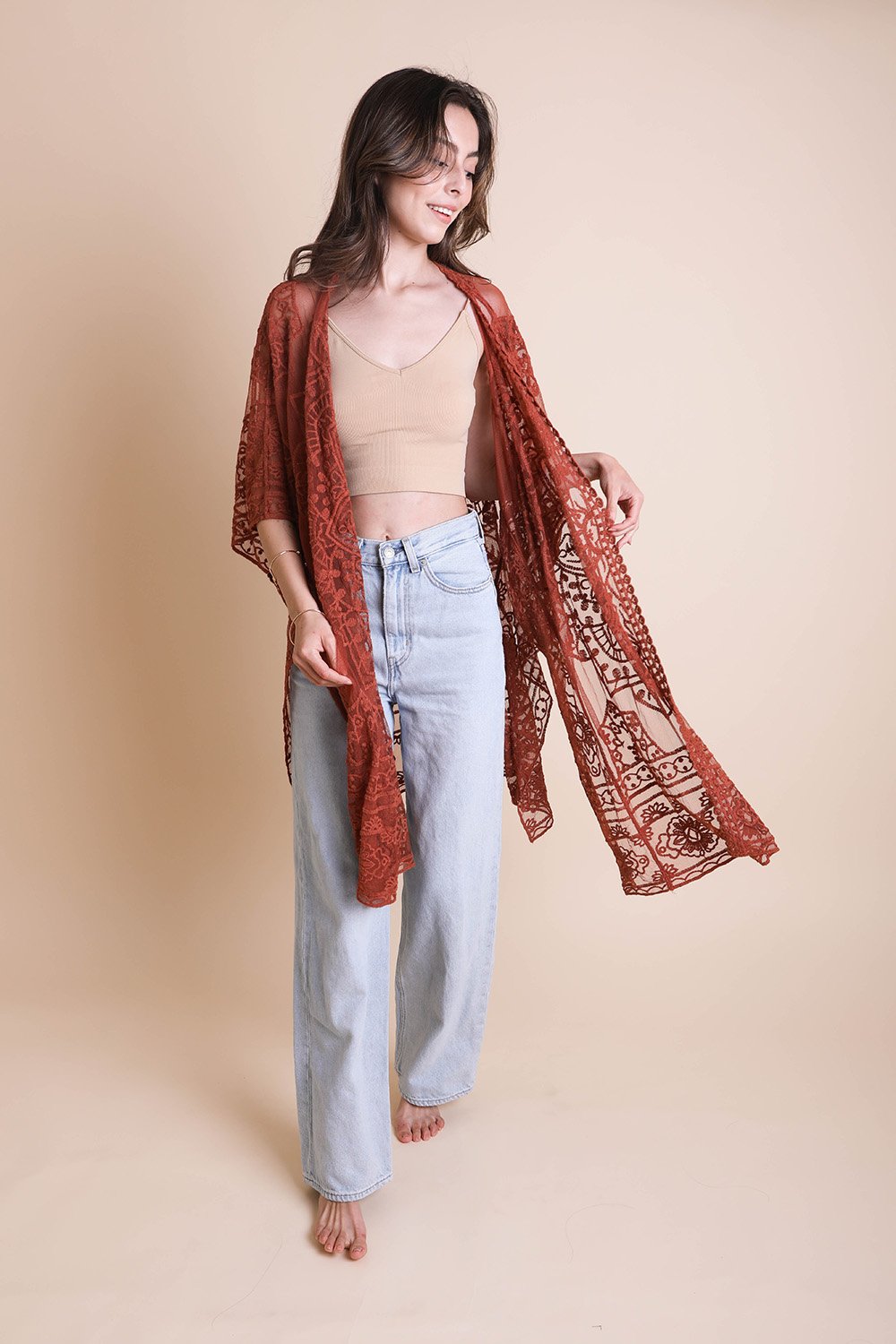 A lightweight floral mandala mesh kimono featuring intricate embroidery, perfect for casual wear.