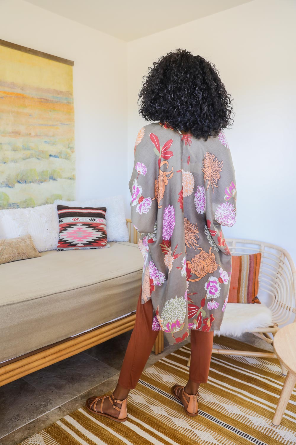 A stylish Floral Motif Combo Kimono featuring vibrant floral patterns, lightweight fabric, and a versatile design suitable for summer wear.