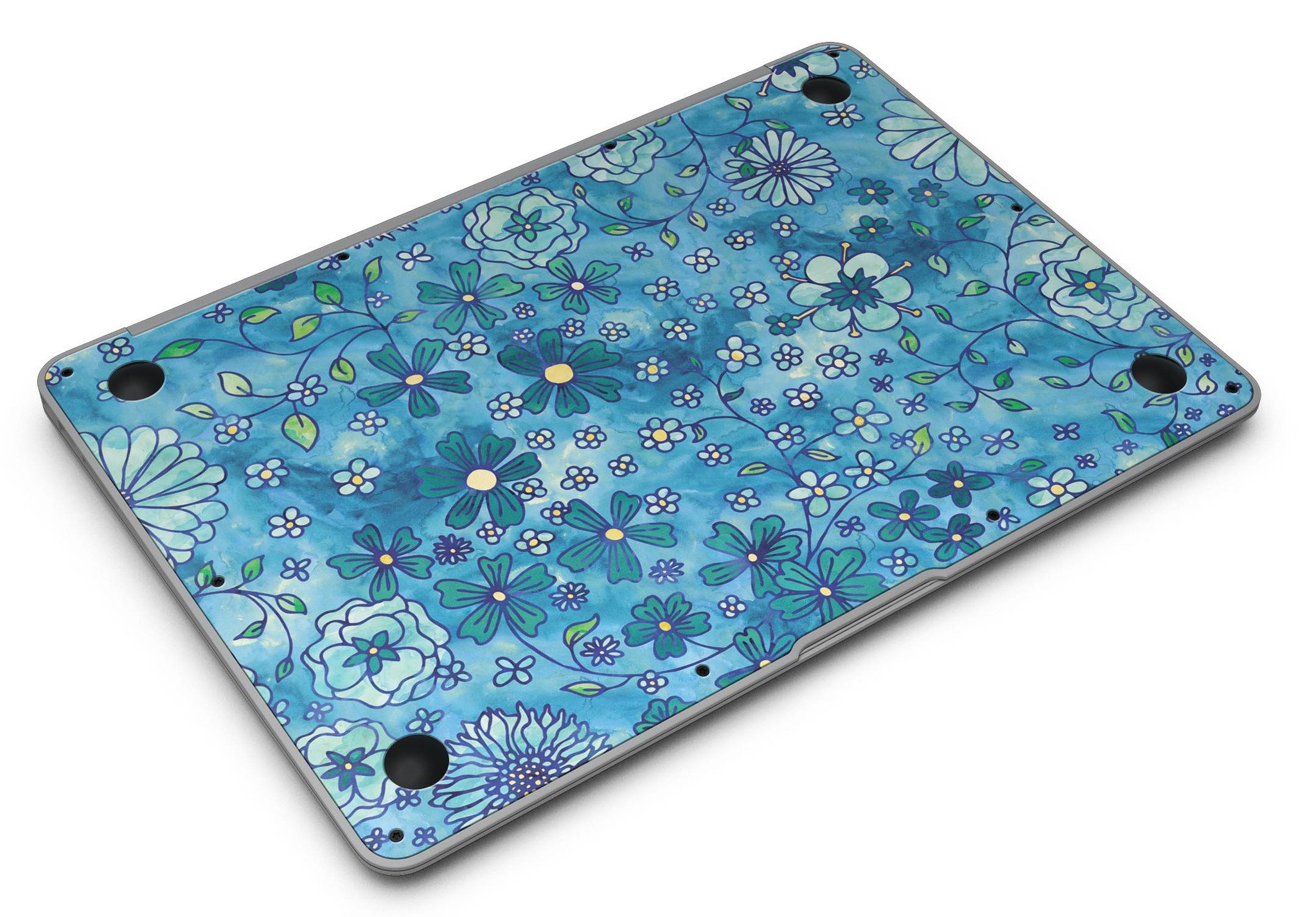 Floral pattern skin on a blue watercolor background for MacBook Air, showcasing vibrant colors and intricate floral designs.