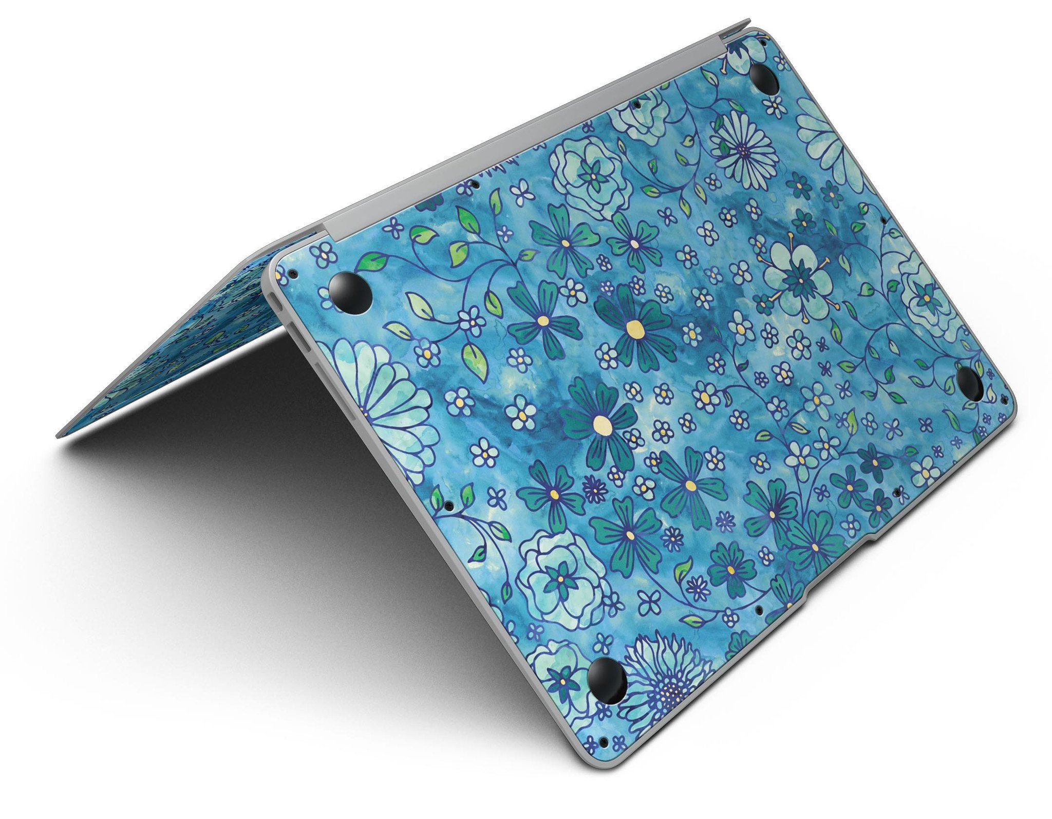 Floral pattern skin on a blue watercolor background for MacBook Air, showcasing vibrant colors and intricate floral designs.