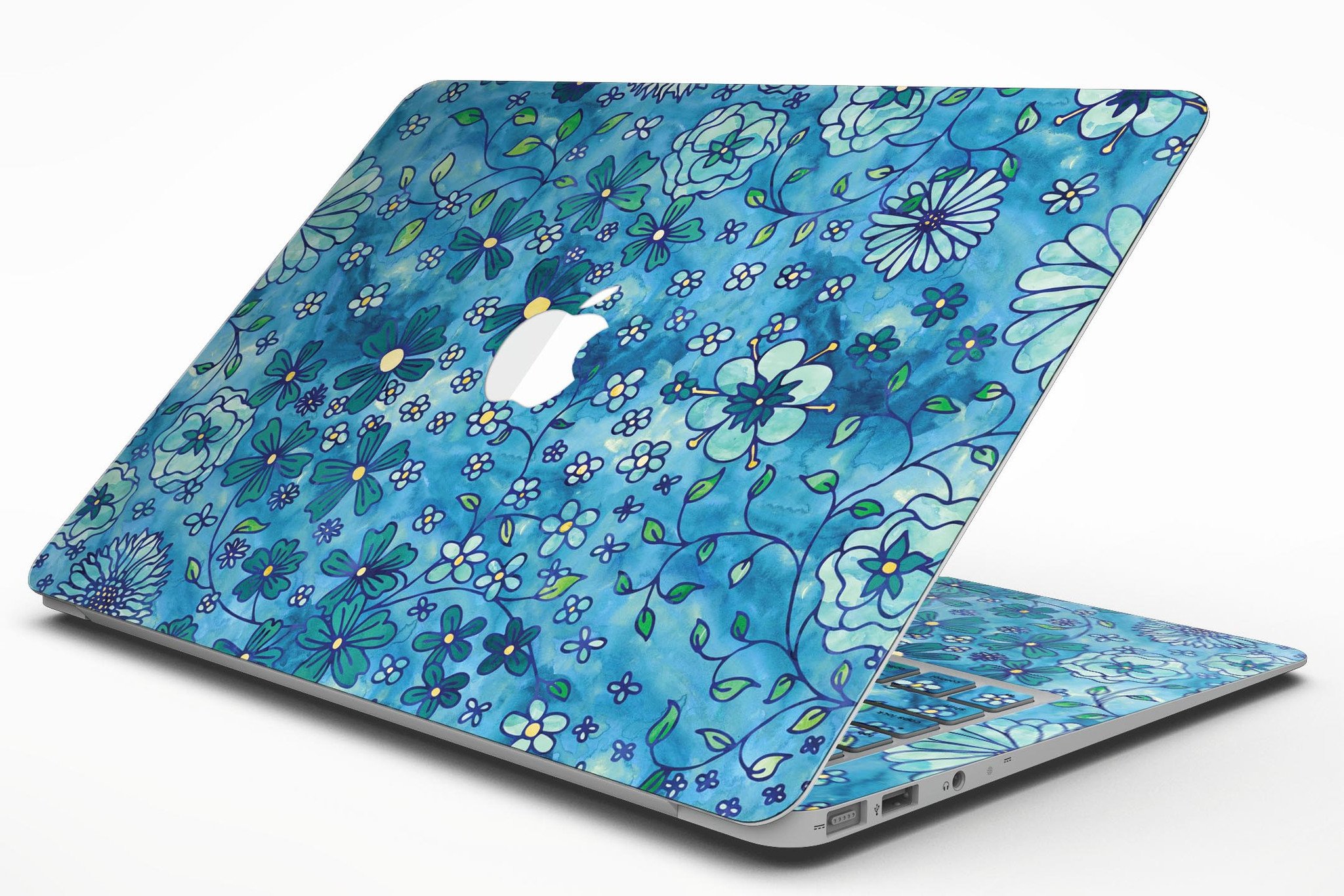 Floral pattern skin on a blue watercolor background for MacBook Air, showcasing vibrant colors and intricate floral designs.