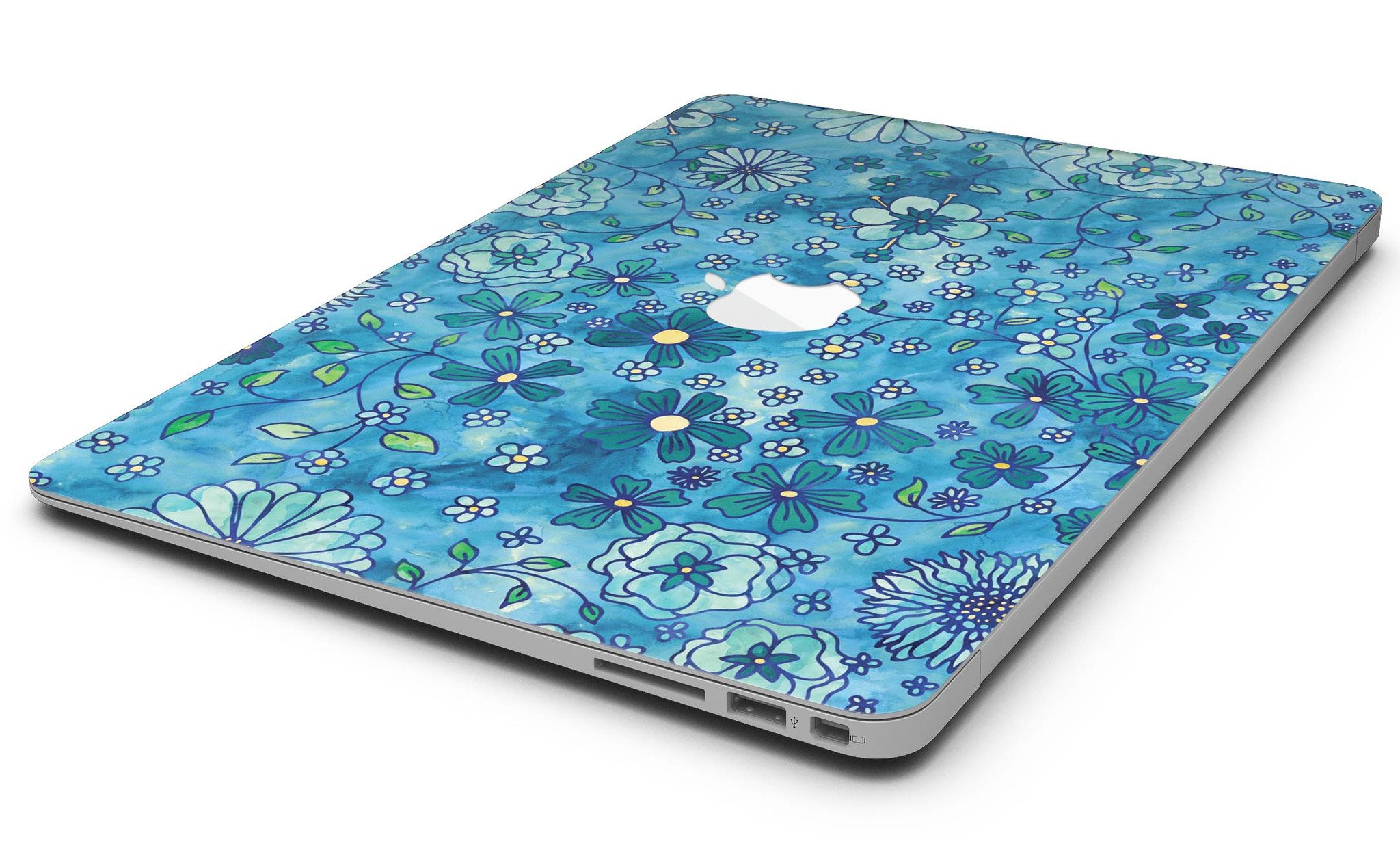 Floral pattern skin on a blue watercolor background for MacBook Air, showcasing vibrant colors and intricate floral designs.