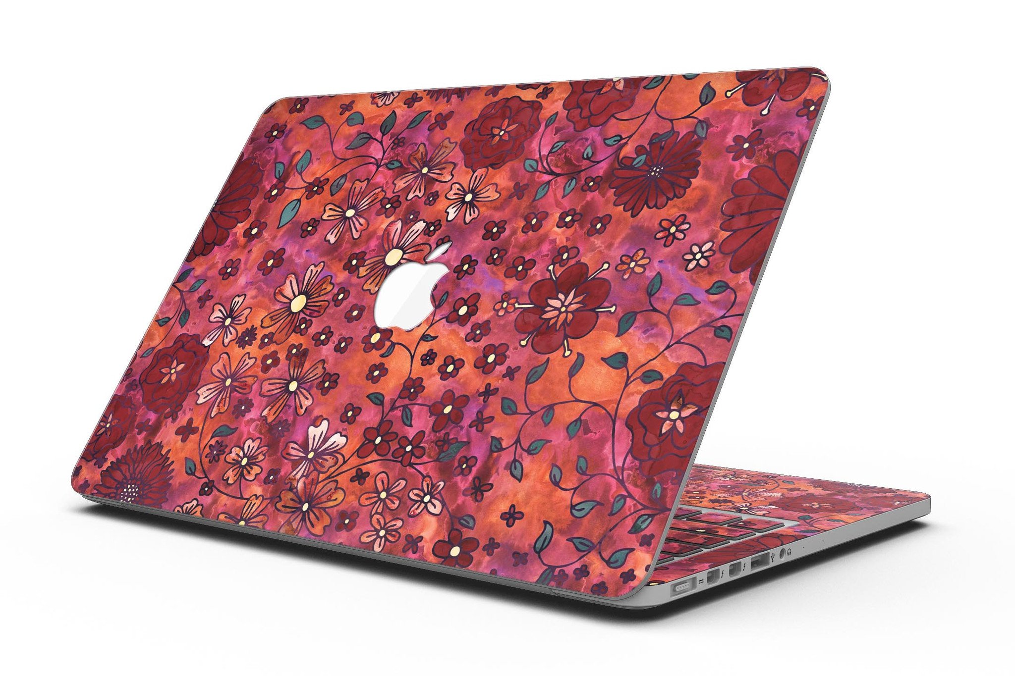 Floral pattern skin on a MacBook Pro with Retina Display, showcasing vibrant red watercolor design.