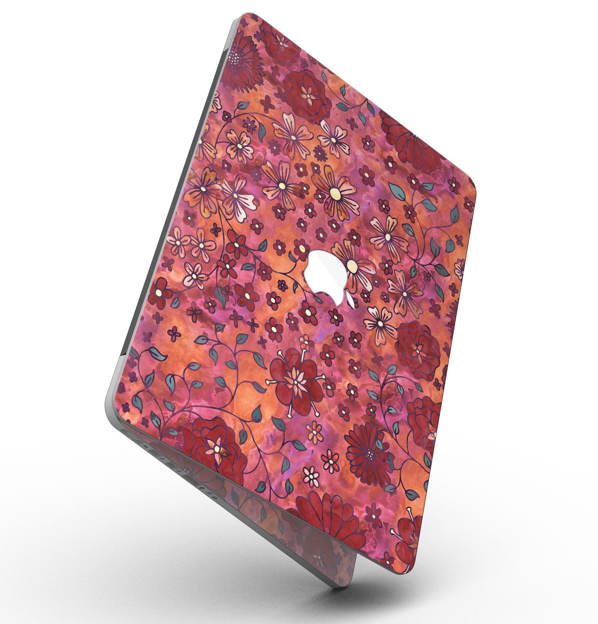 Floral pattern skin on a MacBook Pro with Retina Display, showcasing vibrant red watercolor design.