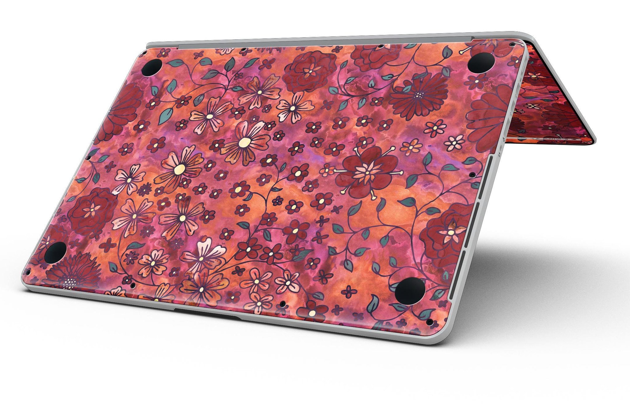 Floral pattern skin on a MacBook Pro with Retina Display, showcasing vibrant red watercolor design.