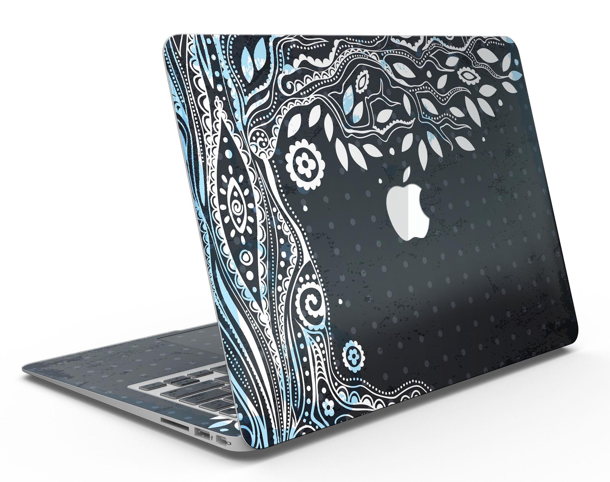 Flourish Black and White Tree skin applied to a MacBook Air, showcasing its stylish design and premium finish.