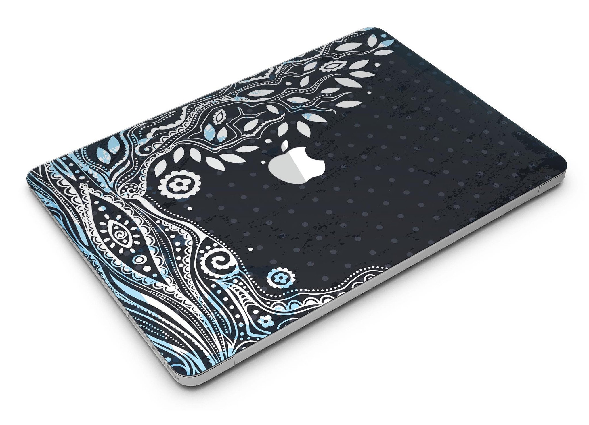 Flourish Black and White Tree skin applied to a MacBook Air, showcasing its stylish design and premium finish.