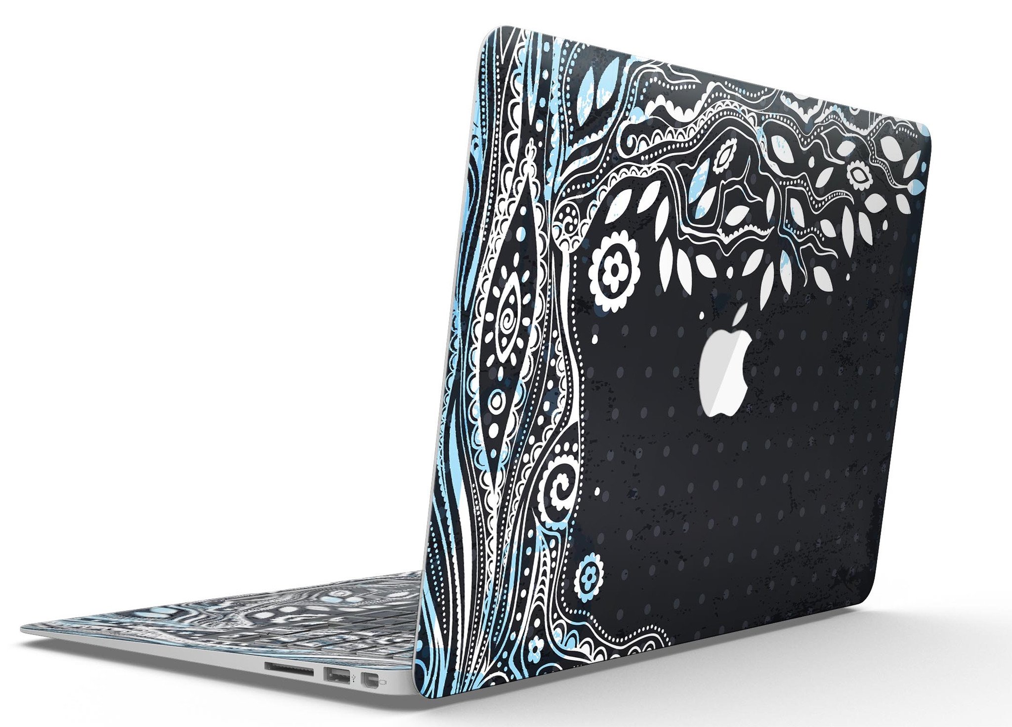 Flourish Black and White Tree skin applied to a MacBook Air, showcasing its stylish design and premium finish.