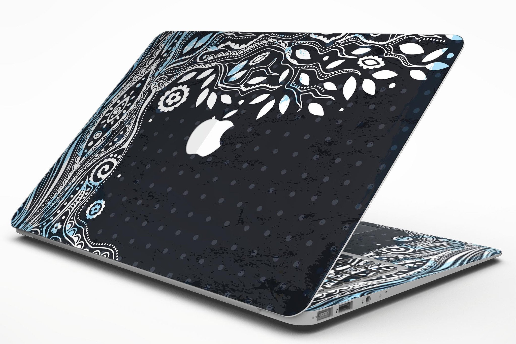 Flourish Black and White Tree skin applied to a MacBook Air, showcasing its stylish design and premium finish.