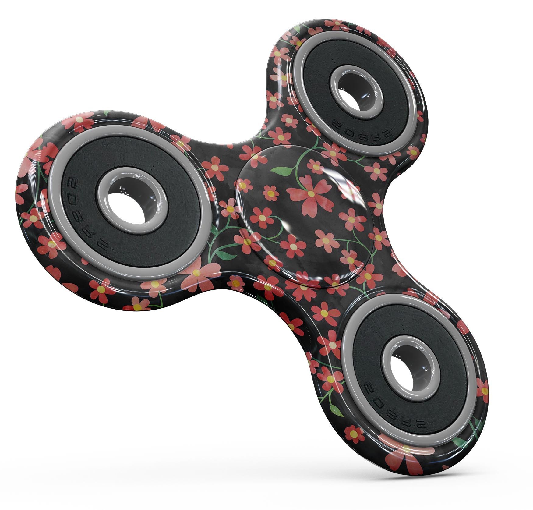 A fidget spinner with a floral design featuring flowers and stems over a black watercolor background, showcasing its vibrant colors and unique style.