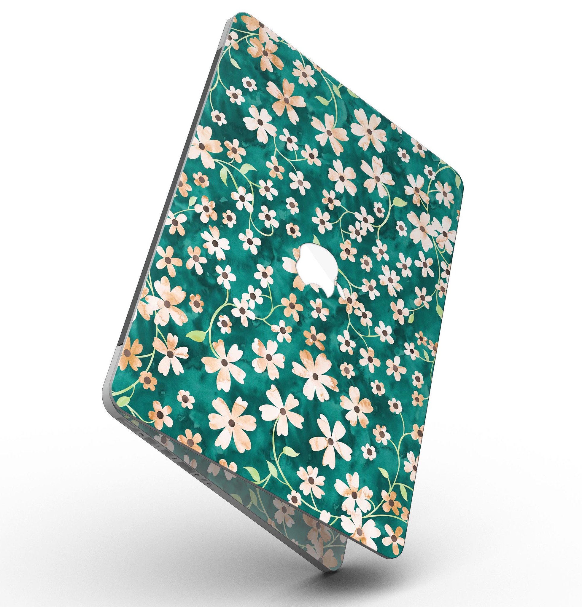 MacBook Pro with a floral design skin featuring stems over deep green watercolor background.