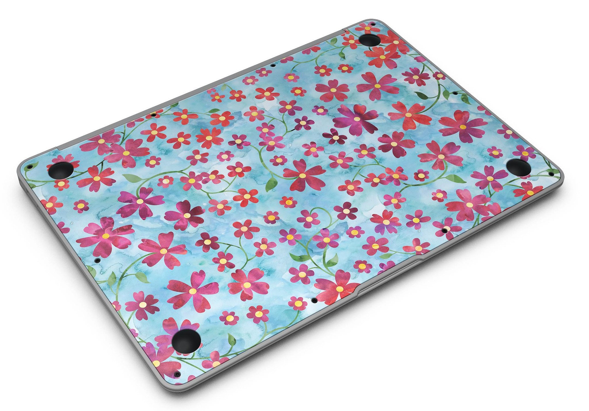 A MacBook Air adorned with a Flowers with Stems skin over a light blue watercolor background, showcasing its stylish design.