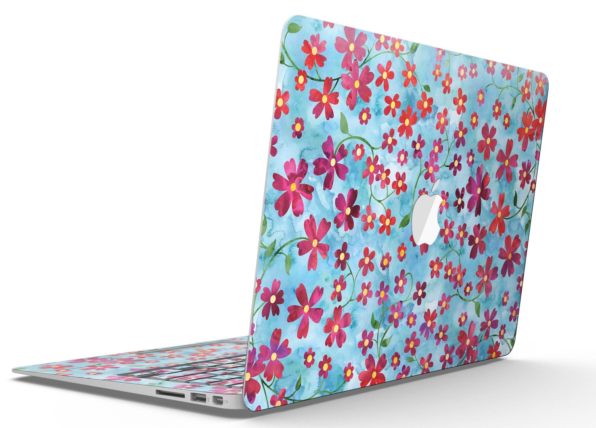 A MacBook Air adorned with a Flowers with Stems skin over a light blue watercolor background, showcasing its stylish design.