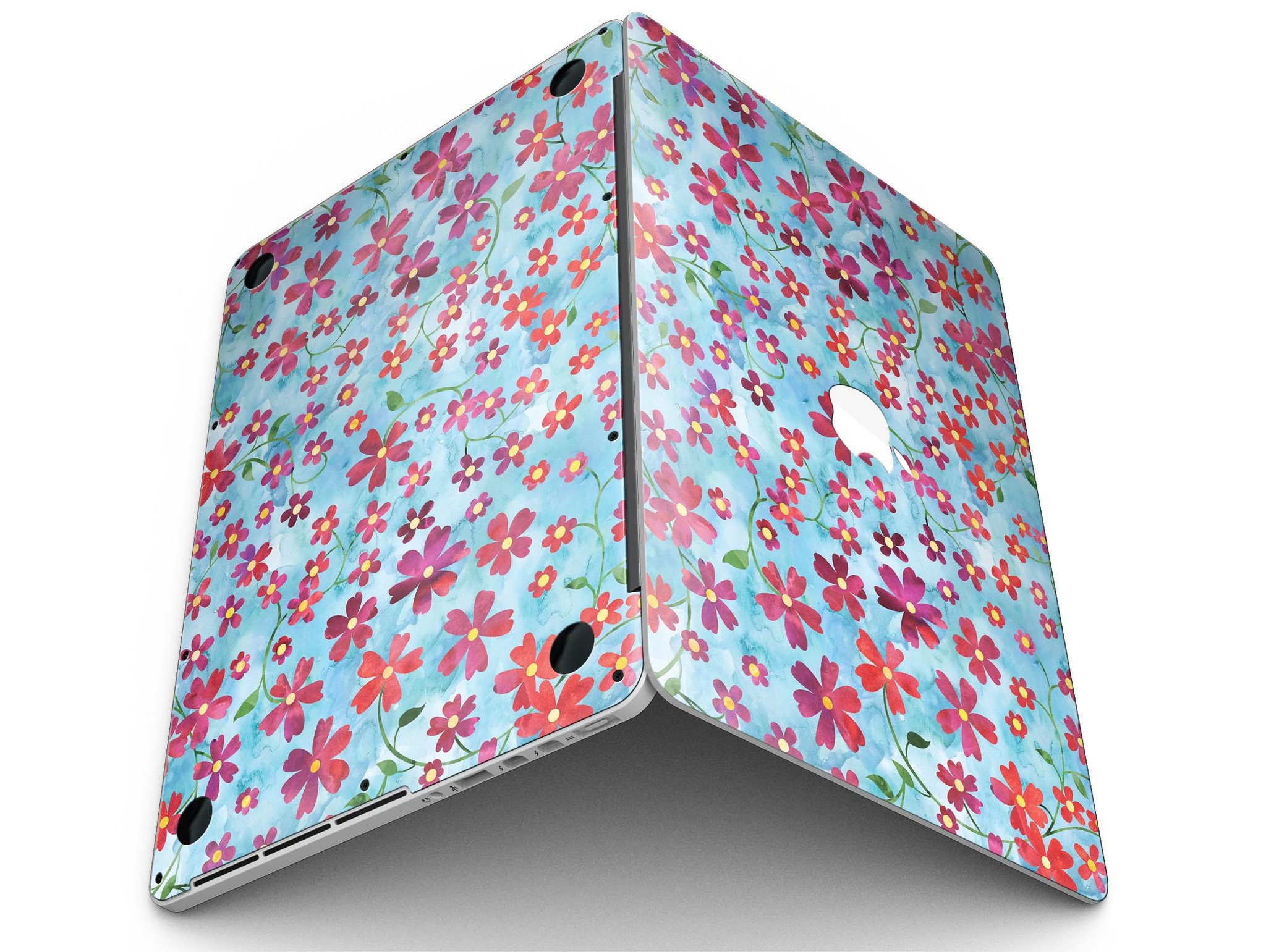 A MacBook Pro with a floral skin featuring stems over a light blue watercolor background, showcasing elegance and style.