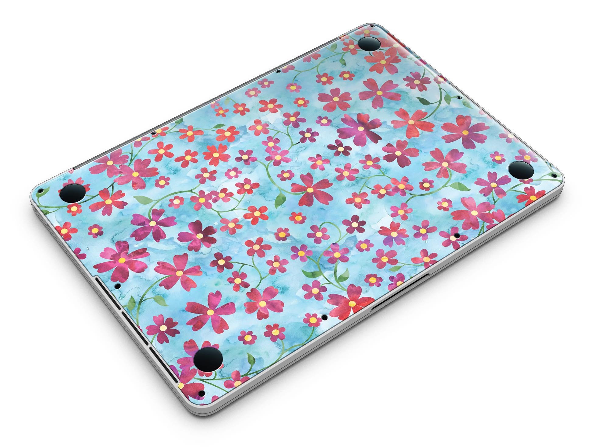 A MacBook Pro with a floral skin featuring stems over a light blue watercolor background, showcasing elegance and style.