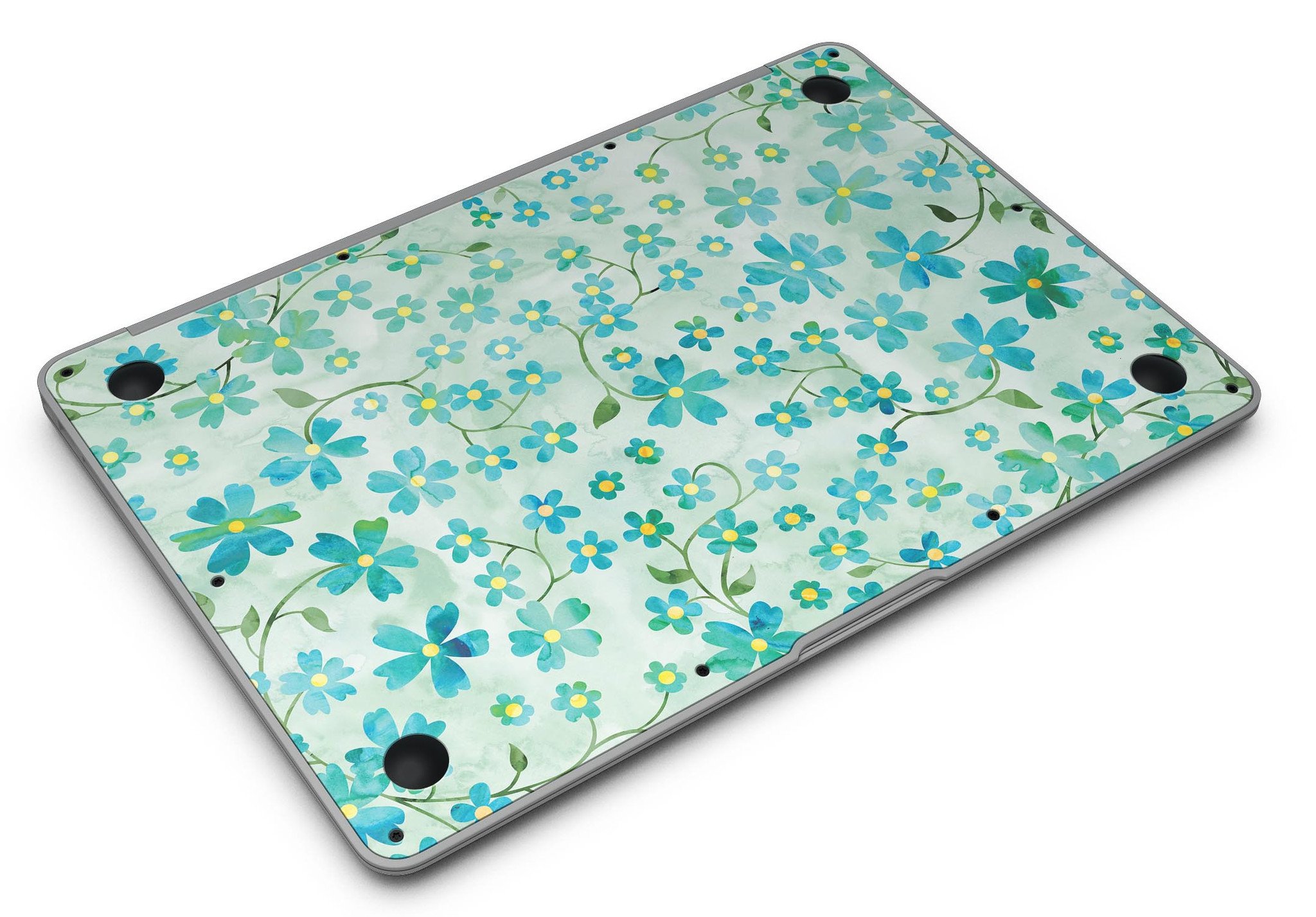 MacBook Air with Flowers and Stems skin over light green watercolor background, showcasing stylish design and protection.