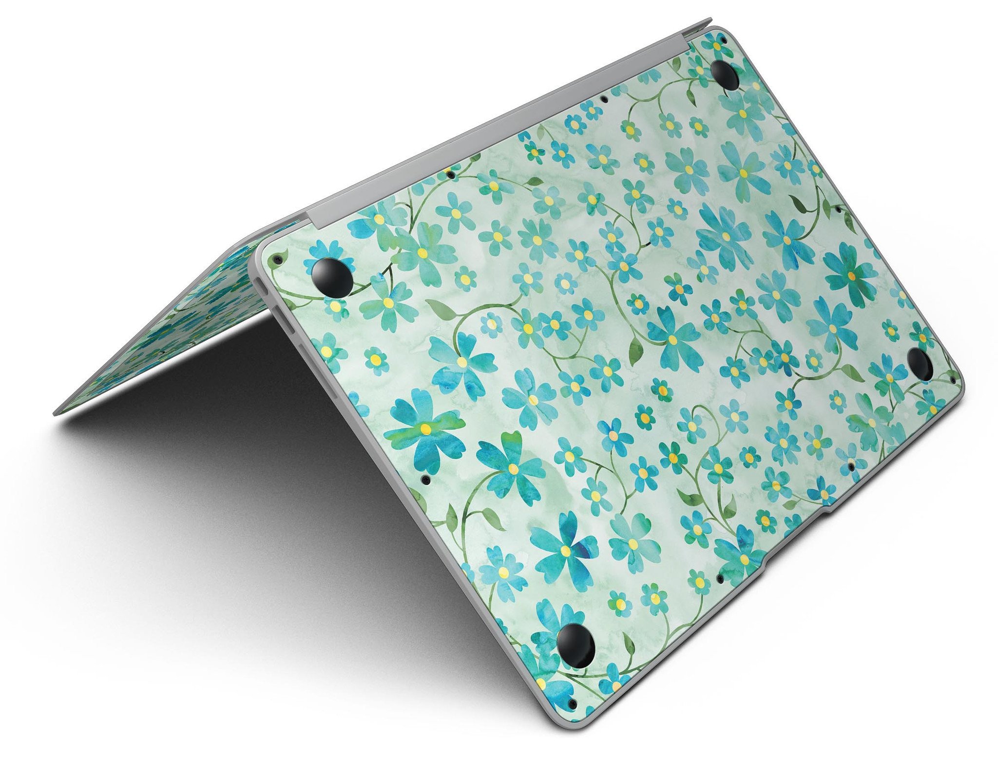 MacBook Air with Flowers and Stems skin over light green watercolor background, showcasing stylish design and protection.