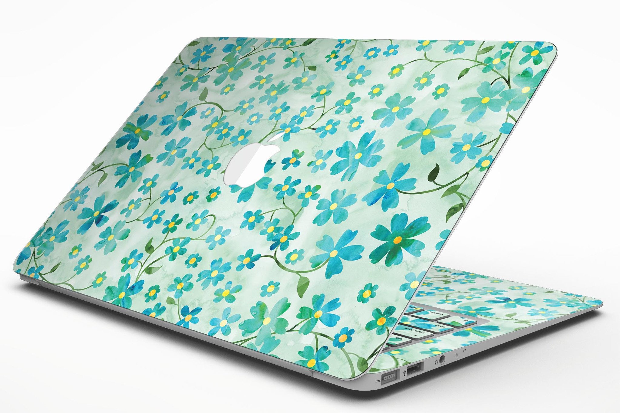 MacBook Air with Flowers and Stems skin over light green watercolor background, showcasing stylish design and protection.