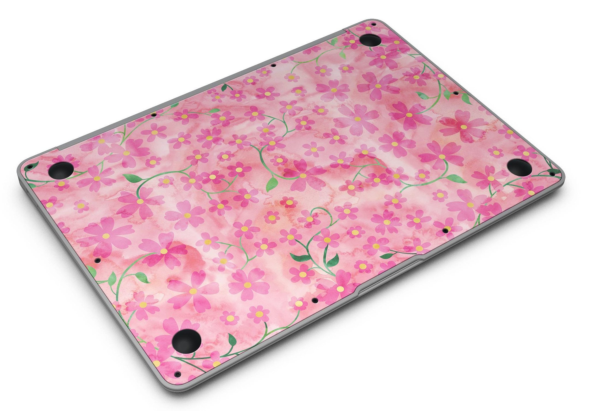 A MacBook Air adorned with a floral skin featuring stems over a pink watercolor background, showcasing vibrant colors and a stylish design.