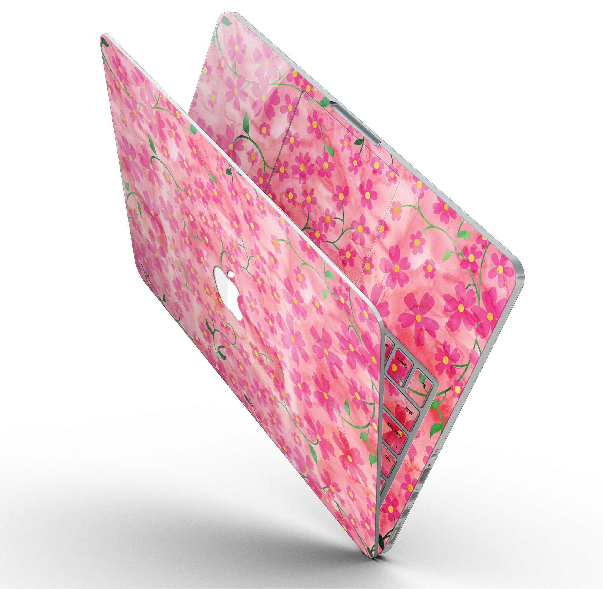 A MacBook Pro with Retina Display featuring a vibrant Flowers with Stems design skin, showcasing a beautiful floral pattern on a pink watercolor background.