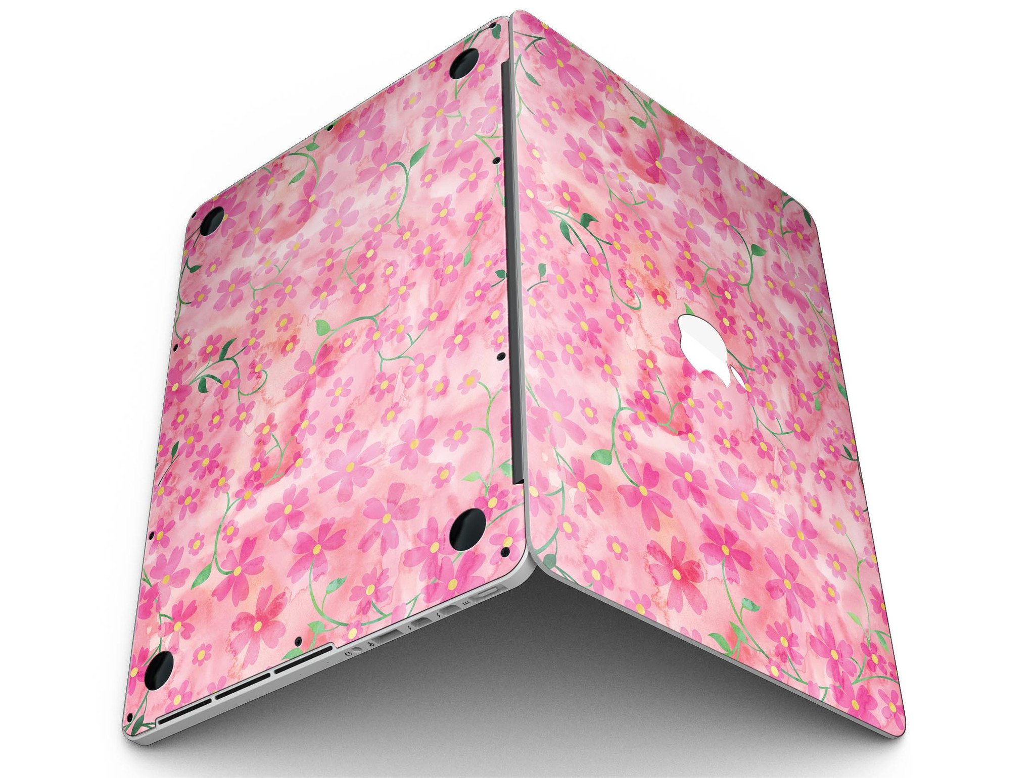 A MacBook Pro with Retina Display featuring a vibrant Flowers with Stems design skin, showcasing a beautiful floral pattern on a pink watercolor background.