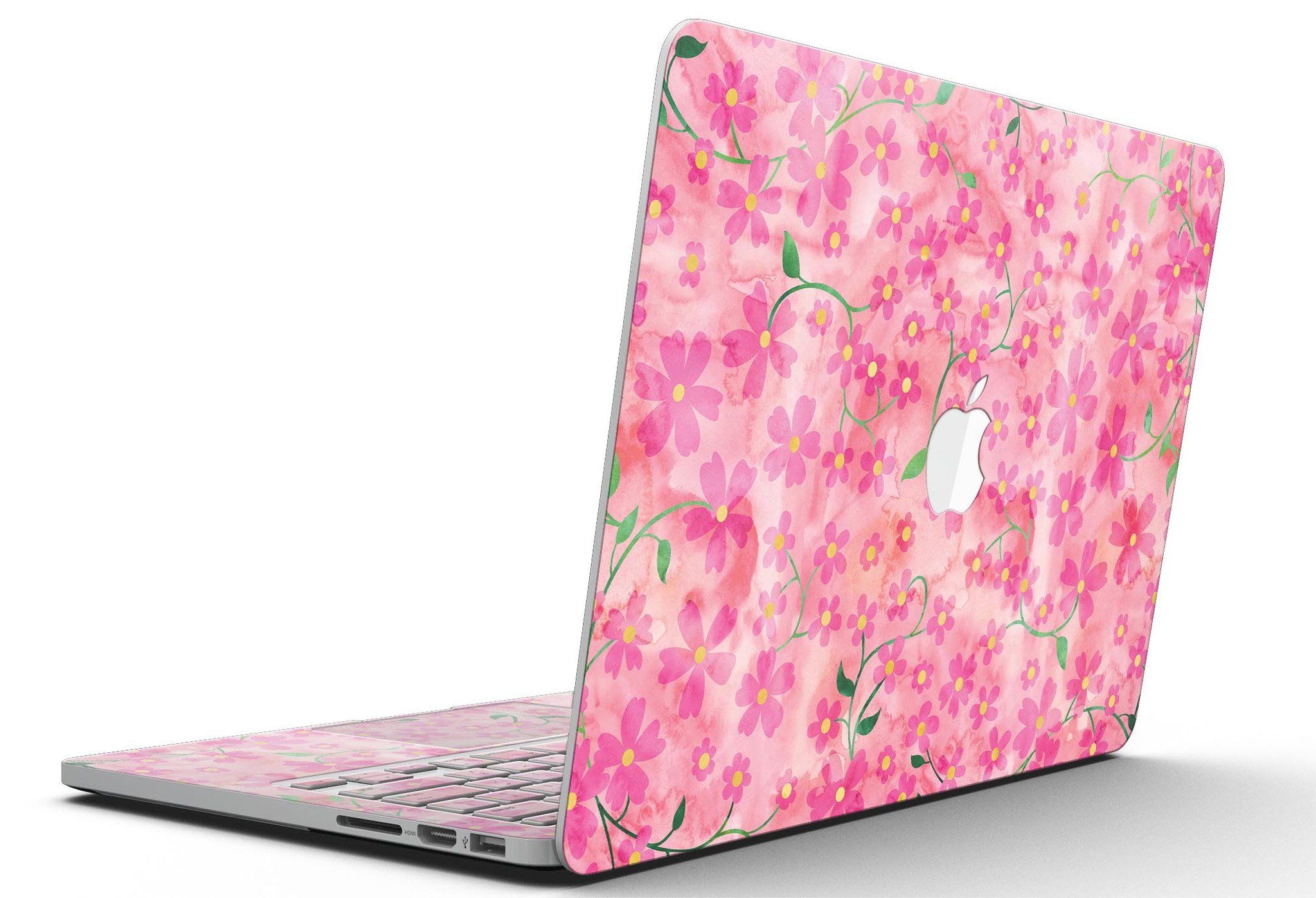 A MacBook Pro with Retina Display featuring a vibrant Flowers with Stems design skin, showcasing a beautiful floral pattern on a pink watercolor background.