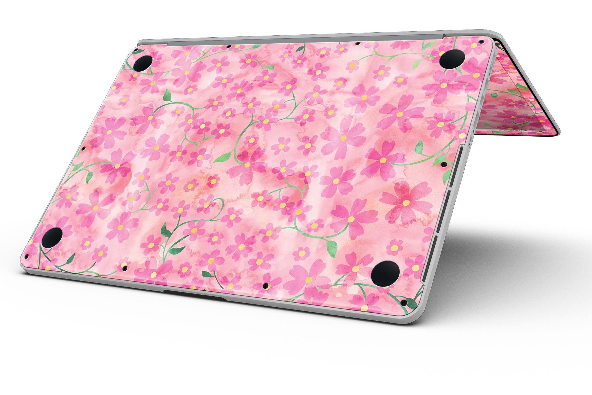 A MacBook Pro with Retina Display featuring a vibrant Flowers with Stems design skin, showcasing a beautiful floral pattern on a pink watercolor background.