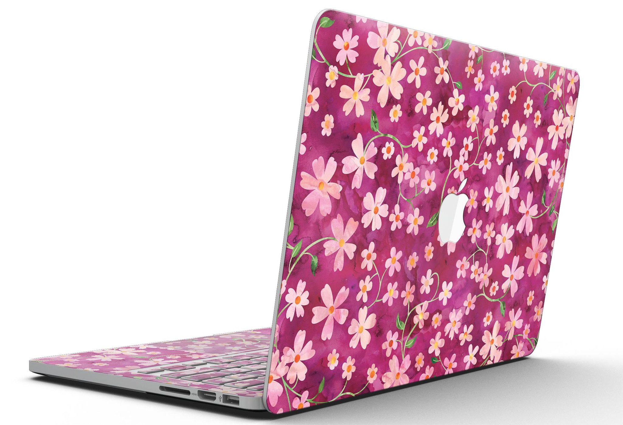 A MacBook Pro with Retina Display featuring a colorful Flowers with Stems watercolor skin, showcasing vibrant floral designs.