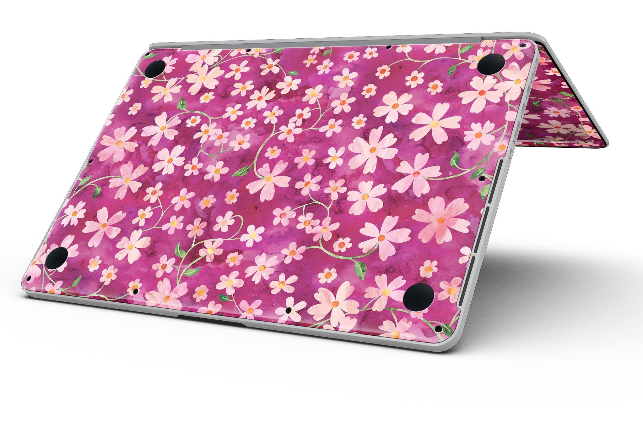 A MacBook Pro with Retina Display featuring a colorful Flowers with Stems watercolor skin, showcasing vibrant floral designs.