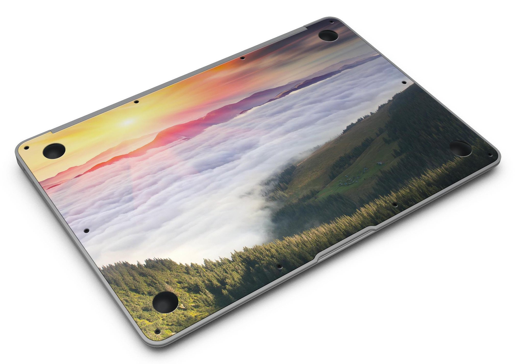 Foggy Mountainside MacBook Air Skin Kit showcasing a scenic mountain design on a sleek laptop surface.